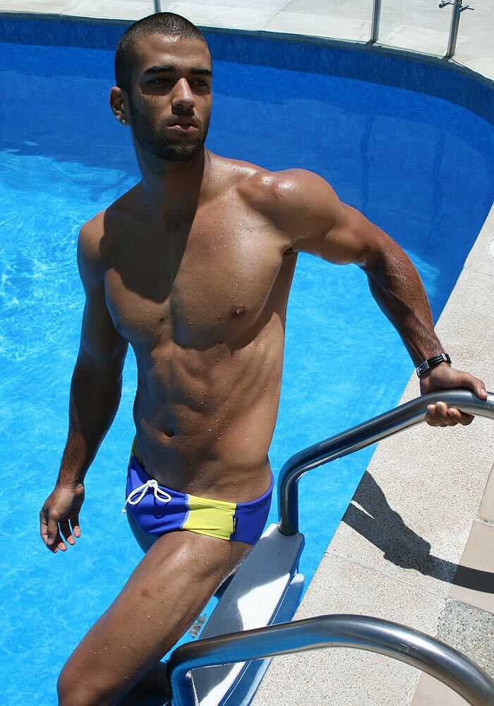 Ergowear Flex Pouch Swimsuit Blue/Yellow On Ladder Beside Pool